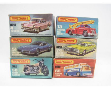Six Matchbox Superfast diecast vehicles in type K and L boxes, to include 4 '57 Chevy, 13 Snorkel Fire Engine, 50 Harley Davi
