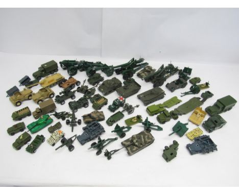 A collection of loose and playworn diecast military vehicles and field guns, including Britains, Corgi, Lone Star, Matchbox, 