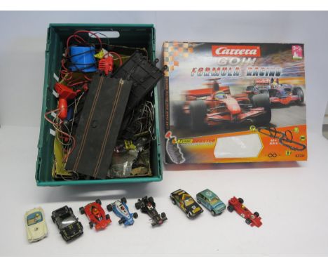 A Carrera Co Formula Racing slot racing set and a collection of loose and playworn Scalextric slot racing cars, track and acc