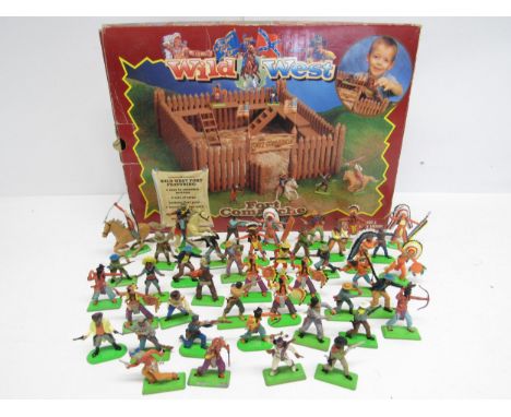 A collection of Britains and Britains Deetail cowboys and Native Americans plastic figures on metal stands (approx. 43). Toge