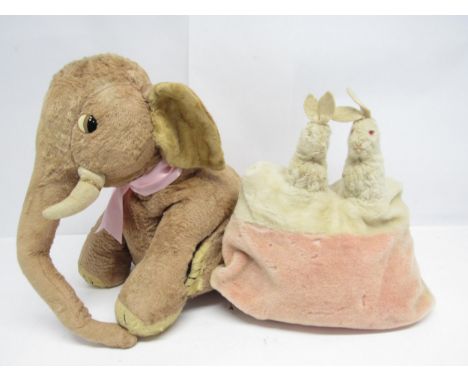 A vintage Merrythought circus elephant pyjama case, together with another pyjama case topped by a pair of white rabbits (2)