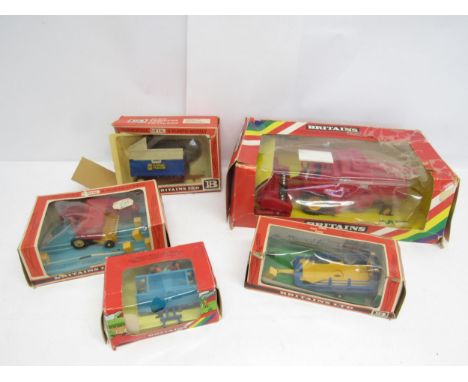 Five boxed Britains 1:32 scale diecast/plastic model farm vehicles and implements to include 9570 Massey-Ferguson Combine Har