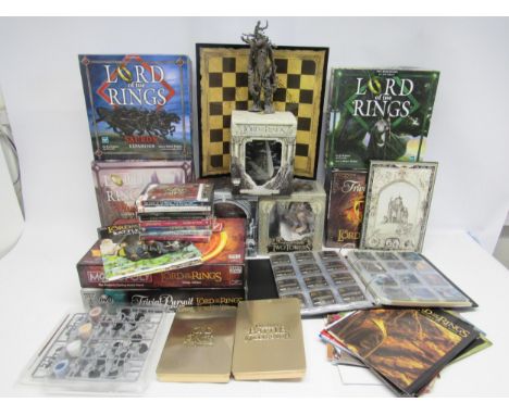 A collection of The Lord Of The Rings collectables including Hasbro Lord Of The Rings The Boardgame by Reiner Knizia with Sau