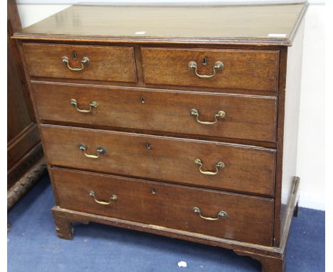 An oak chest of drawers W.102cm