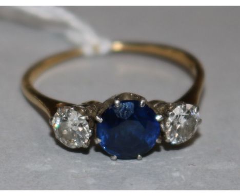 A sapphire and diamond three-stone ring, 18ct yellow gold claw setting