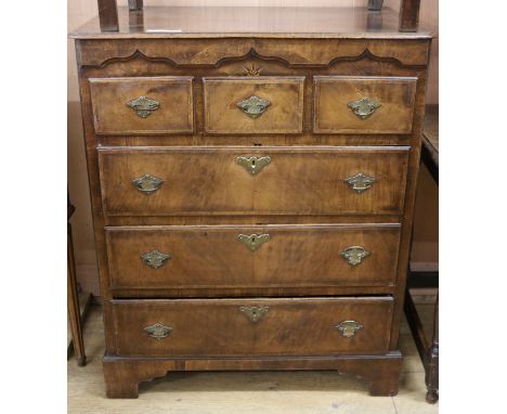 A mid 18th century North Country inlaid mahogany chest, of three short and three long drawers, W.82cm