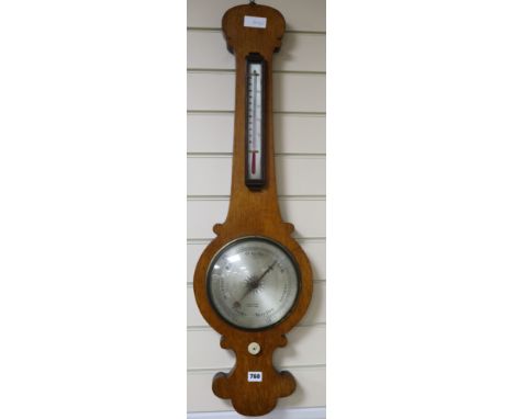 A Victorian oak barometer by Ketterer of Ware, H.95cm
