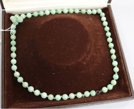 A jade coloured necklace