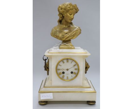 A white marble clock, with bronze bust surmount