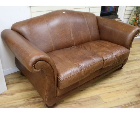 A modern brown leather 2 seater sofa, W.200cm