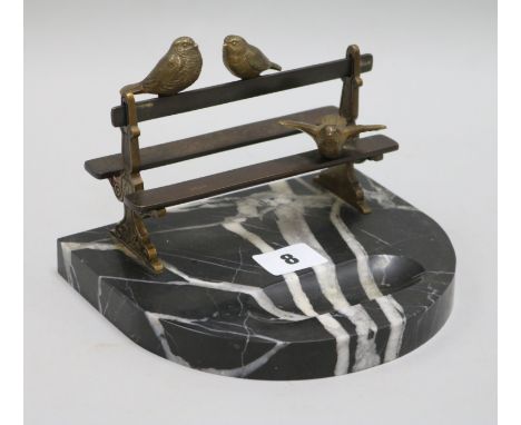 A Vide de Poche Art Deco bronze birds on a bench, on a marble base