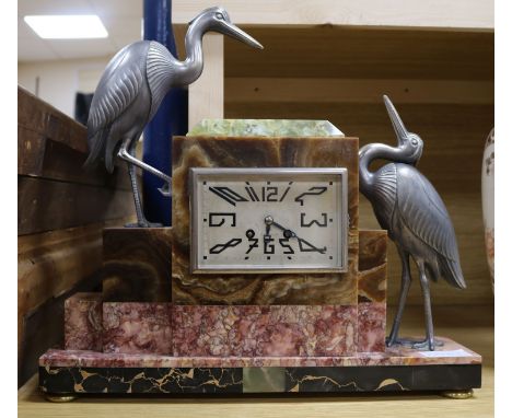 A rouge marble Art Deco French clock