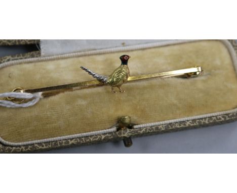An Edwardian 15ct gold enamel and gem set pheasant bar brooch, in fitted case