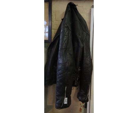 A vintage black leather real cow hide leather black motorbike jacket size 44. 