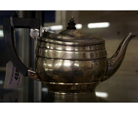 A hallmarked silver teapot, indistinct marks, total weight 9.76oz. 