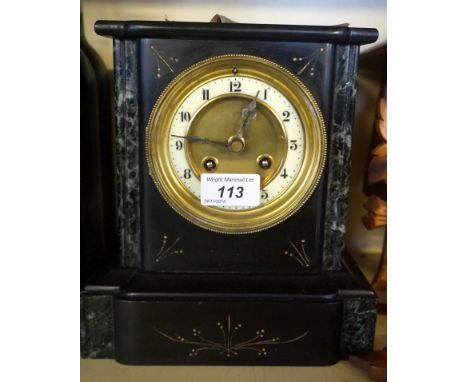 A Victorian marble and slate mantel clock.
