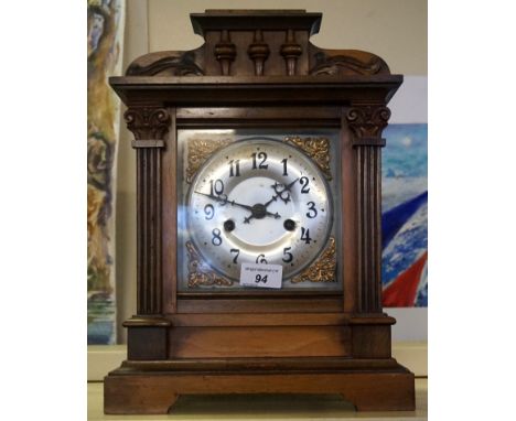 An early to mid 20th Century mahogany mantel clock.