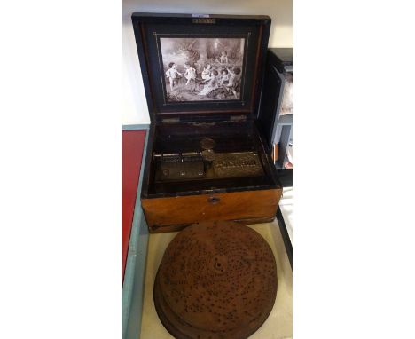 A Late 19th Century Schutz Marke German Polyphon, with a quantity of discs. In need of restoration.
