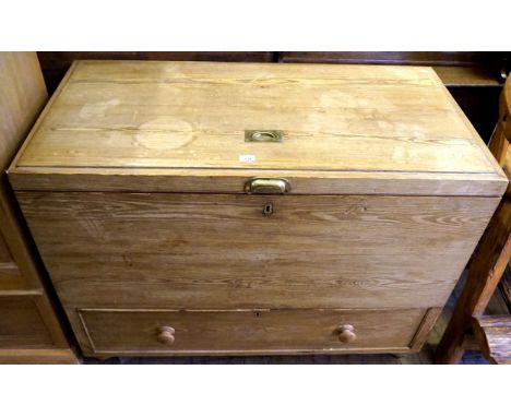 A good late 19th/erly 20th Century solid pine storage trunk of wide proportions with single base drawer.