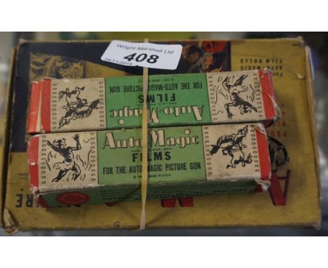 A vintage Automagic picture gun with two boxed films.