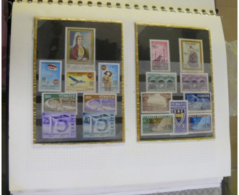 An album containing a quantity of assorted stamps and first day covers.