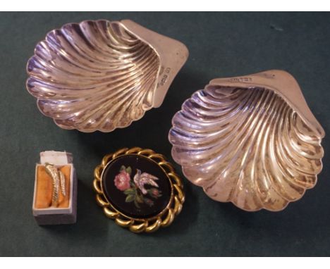 A pair of Sheffield hallmarked silver open shell butter dishes, made by Aicken Brothers Sheffield, a 9ct gold ring in the for