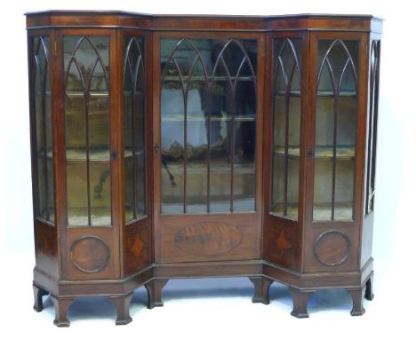 A good quality and elegant Edwardian glazed mahogany display cabinet, the inverted form featuring seven lancet arched panels 