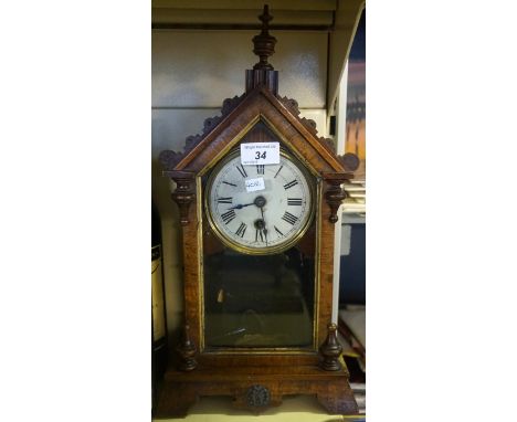 An early 20th Century mahogany cased Gothic revival mantel clock.