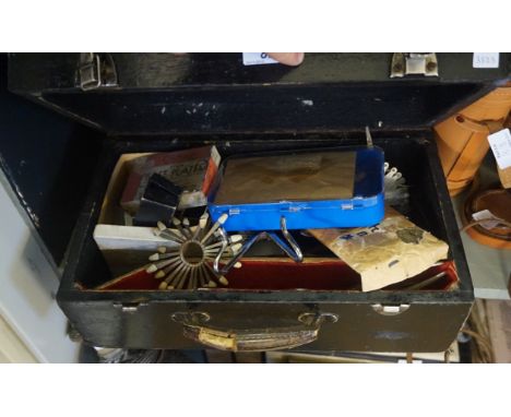 A mixed lot of dental equipment, including various porcelain caps and tools
