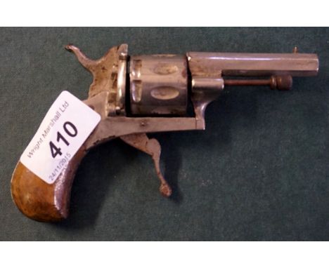 A vintage replica model of a muff pistol. 