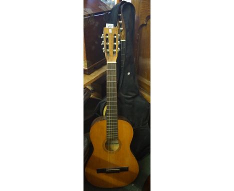 Two vintage acoustic guitars.