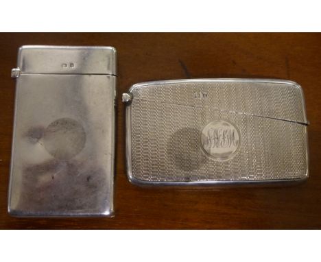 A Birmingham hallmarked silver vesta case with engine turned decoration together with a further Birmingham hallmarked silver 