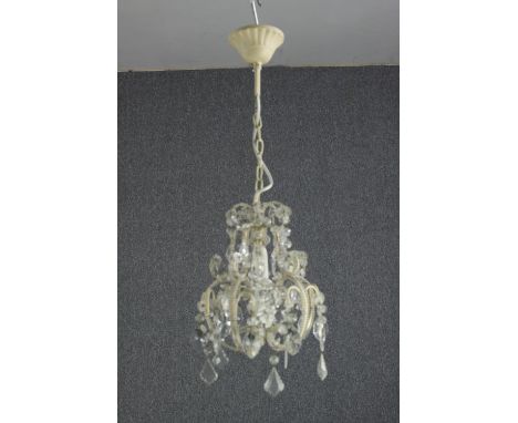 A small chandelier of just one light surrounded by tear and pear drop glass. H.63 Dia. 25cm. 