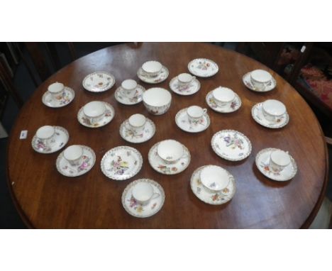 A 'Dresden' and  'Nuremberg' part tea and coffee service with painted floral decoration and gilt borders