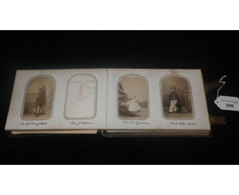 A Victorian photograph album, containing a selection of portrait photographs