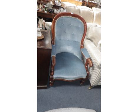 A Victorian walnut framed armchair, upholstered in blue velvet and an oak spinning chair