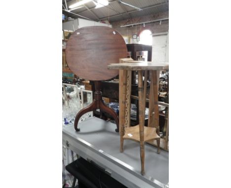 A 19th century mahogany tripod table, a stripped pine shelf and a similar table