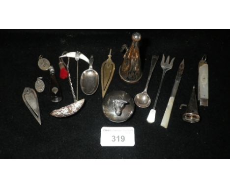 A silver pickle fork, salt spoon, book mark and other items