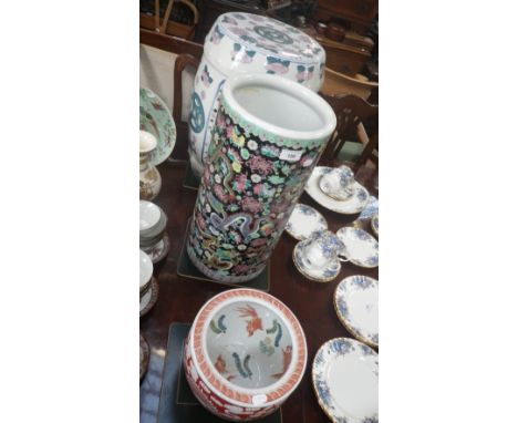 An Oriental style ceramic garden seat, a stick-stand and a jardiniere (3)