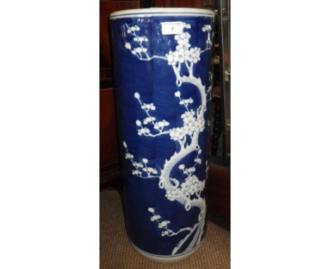 A 19th century style Japanese porcelain stick-stand, with blossom tree decoration on blue ground, 24" high