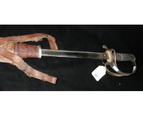 A George V Royal Artillery Officer's sword, named 'A H Sylvester' in original leather scabbard 