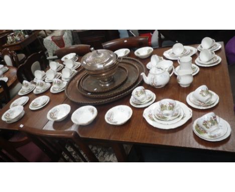 A Duchess china tea and breakfast service, decorated with fox hunting scenes