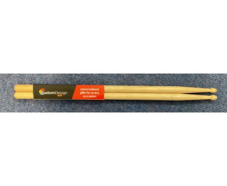 Charlie Watts signed drum sticks. These drum sticks are in new condition, and one is signed by the late Charlie Watts. Size 5
