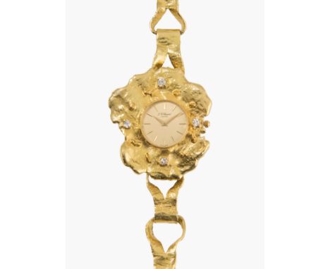 Chopard, 1970er Jahre750 Gelbgold. Quarzwerk. Organisch gestaltet und verziert mit vier Brillanten von zus. ca. 0.40 ct. Verg