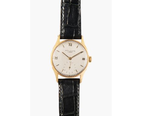 Patek Philippe, um 1945Ref. 1516. 750 Gelbgold-Gehäuse Nr.299881, 31,5 mm, teils satiniert. Handaufzug Kal. 12-120, Werk Nr. 