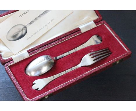 A silver trefid spoon and matching fork, Sheffield 1949, in a leather fitted case 