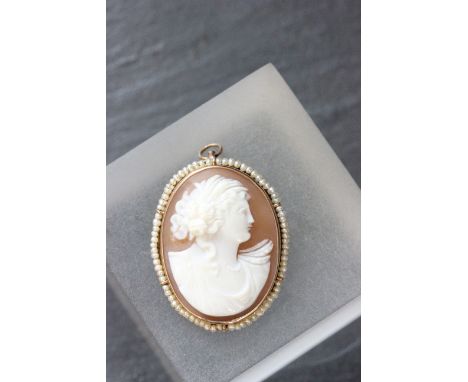 Yellow metal & seed pearl mounted cameo brooch