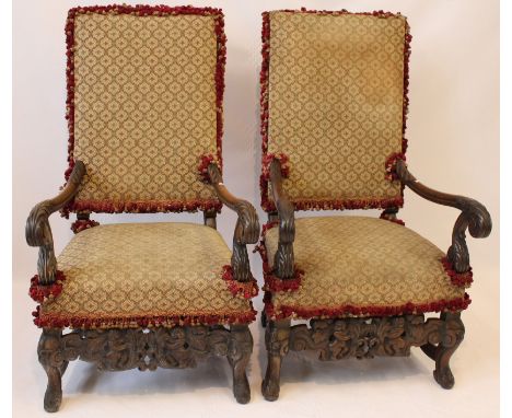 A pair of Carolean Revival carved mahogany framed armchairs, circa 1900
Each upholstered in sympathetic tapestry style fabric