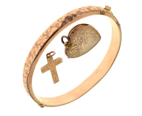 9ct rose gold hinged bangle, engraved with foliate decoration, Chester 1919, (a/f), a 9ct gold cross pendant, with foliate en