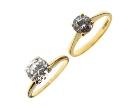 Cubic zirconia solitaire 18ct gold ring, size N approx, and a cubic zirconia solitaire '14K' ring, size K approx, 5.5g gross 